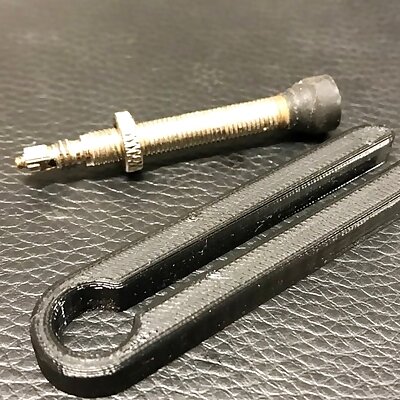 Presta valve nut loosening tool