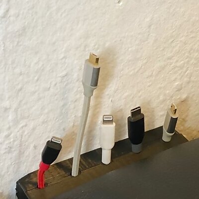 Couch cable holder