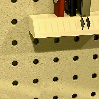 Pegboard holder for USB sticks and MicroSD cards