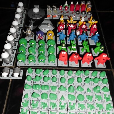 All cardboard counters of the boardgame The awful green things from outerspace as 3D figures