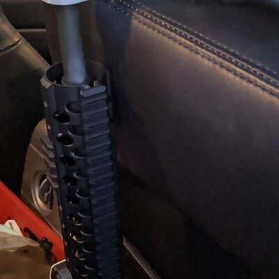 Seatback rifle rack