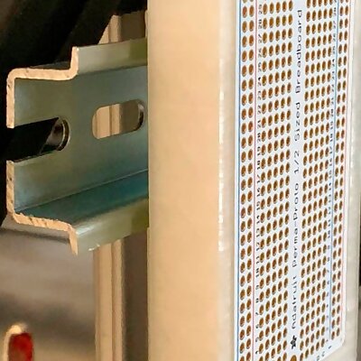 A vertical din rail mount for an Adafruit perma proto board