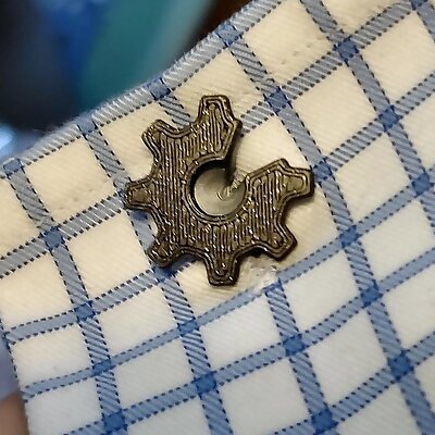 Cufflink with Open Hardware and open source logos