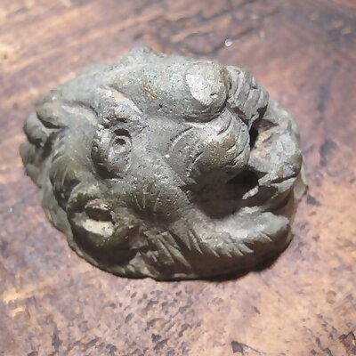 Roman lions head in bronze