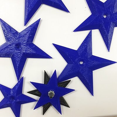various sized stars with holes