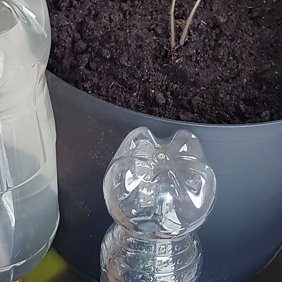 Selfwatering plant container spike for PET bottles