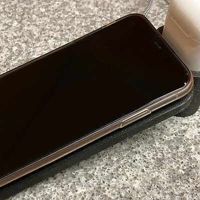 Wireless iPhone charging stand with integrated AirPod dock