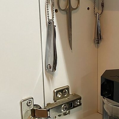 Hanger for scissors and other tools  Ikea mirror cabinet