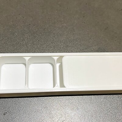 Pill box with sliding lid