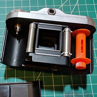 TAXONA 35mm film spool