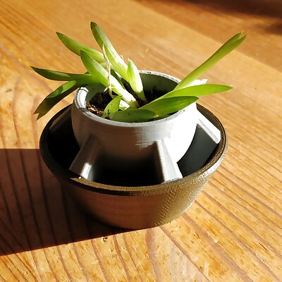 Small simple flowerpot with drainage holes
