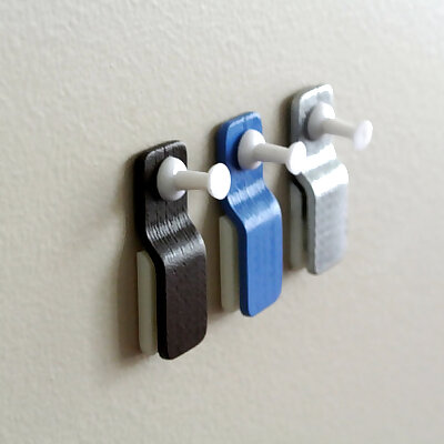 Wall mount paper clip