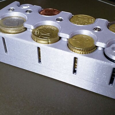 Euro coin dispenser with screws