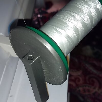 Right angle sewing machine spool adapter