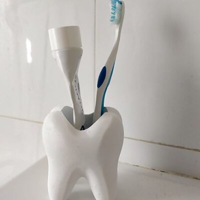 A cup for toothbrush and toothpaste
