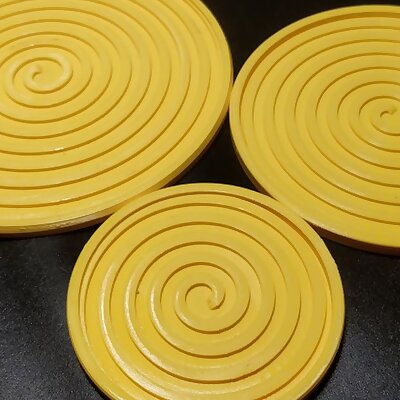 Round coasters with spiral pattern