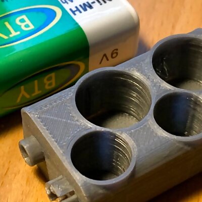 AA LR6 and AAA LR03 battery holder shaped as a 9V battery