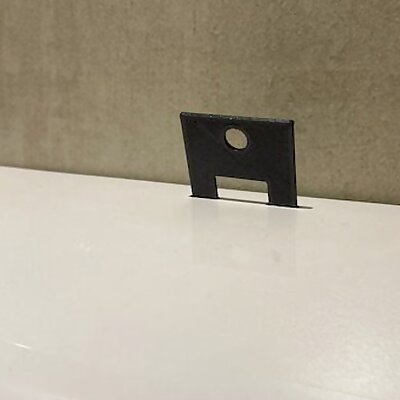 Cliver paper towel dispenser key