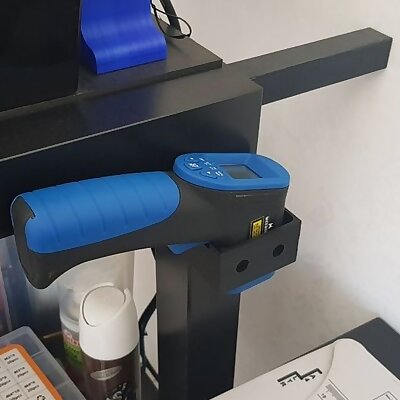 Infrared thermometer wall holder