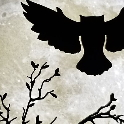 Owl in flight silhouetted by moon lithophane