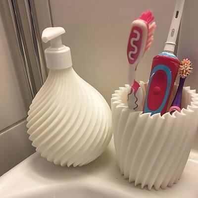 Toothbrush holder and soap dispenser