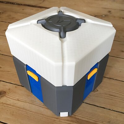 Overwatch loot box in separated colored parts