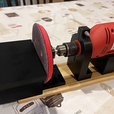Drill clamp with sanding table attachment