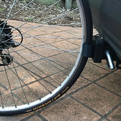 Parametric bike wheel clip for car tow receiver