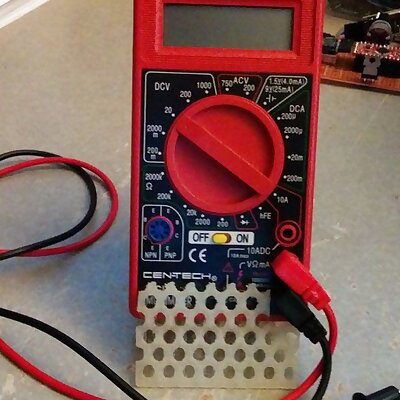 Multimeter holder with holes