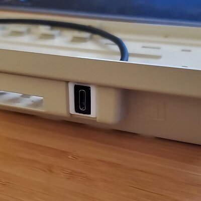 Apple M0110 cable hole plug