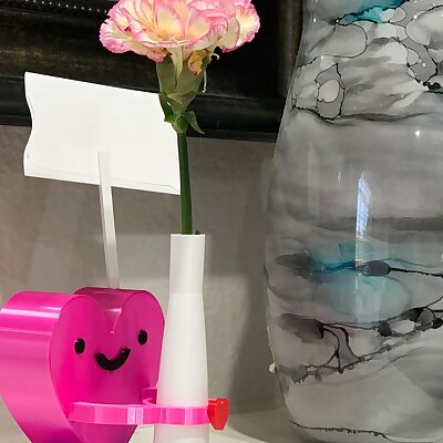 Cute heart holding single flower vase