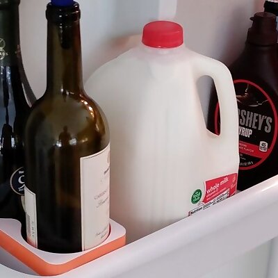 Wine holder for fridge door shelf