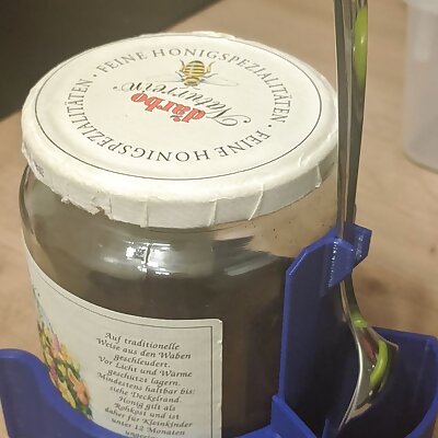 Spoonholder for honeyglas