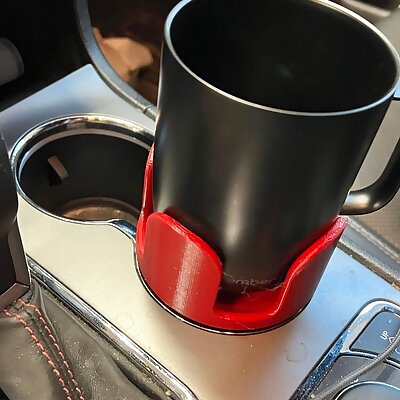 Car cup holder for cups with a handle