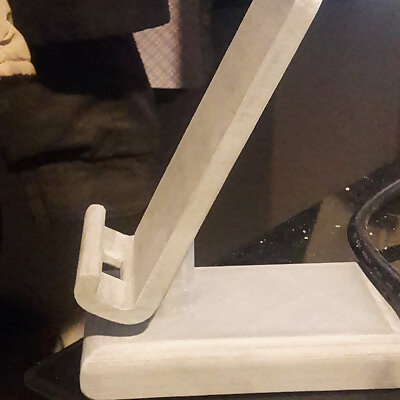 Phone stand with charing port