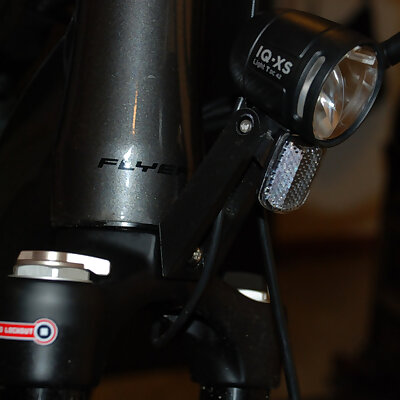 Holding arm for bicycle front light