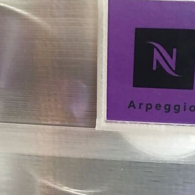 Nespresso badge holder