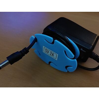 Cord Minder for DC Power Supply