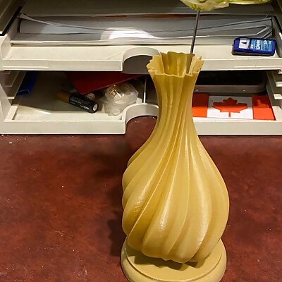 Spiral vase with weighted base