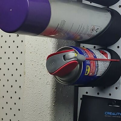 Spray can wall holder
