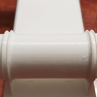 Minimal width universal spool holder for drybox
