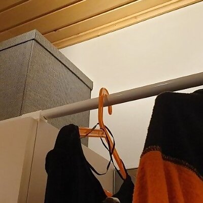 Coat hanger rack on a cubboard
