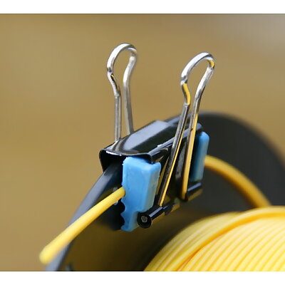 Binder clip for filament on spool