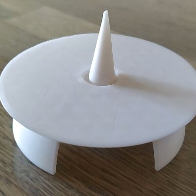 Candle holder with adjustable spike