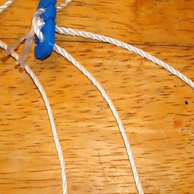 String  twine  cord tensioner with slots for easy use