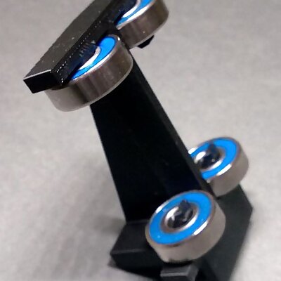 Ball bearing support for Makerbot filament rolls on Replicator 22X