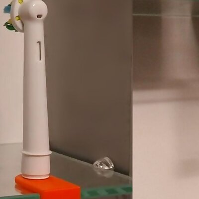 Electric toothbrush head clip