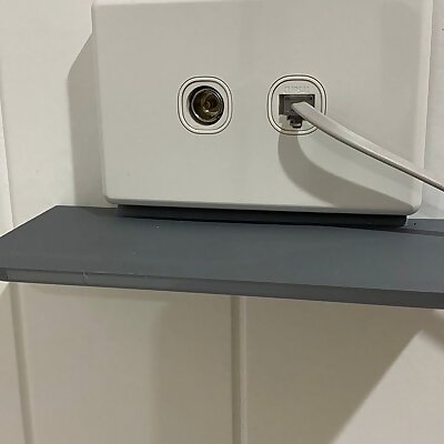 Electrical outlet shelf