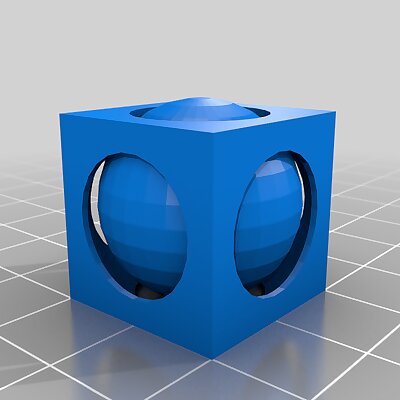 Captive ball in cube fidget toy
