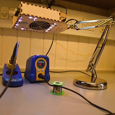 Solder fume extracter and lamp